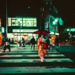 geisha crossing a pedestrian lane